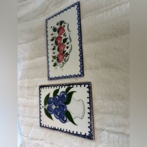Two hand painted Italian fruit  porcelain and terricotta tiles